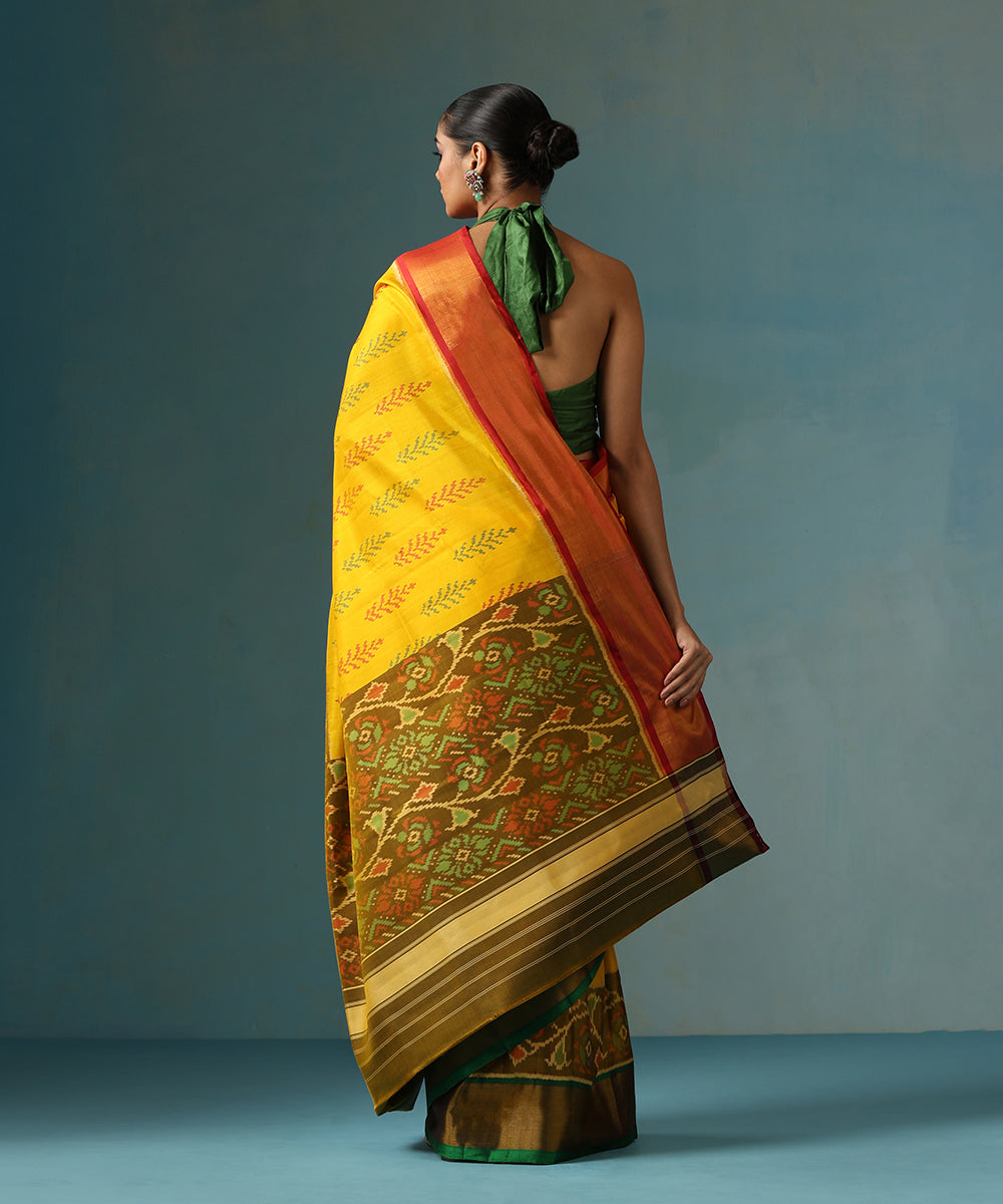 Handloom_Yellow_Pure_Mulberry_Silk_Ikat_Patola_Saree_With_Double_Border_WeaverStory_03