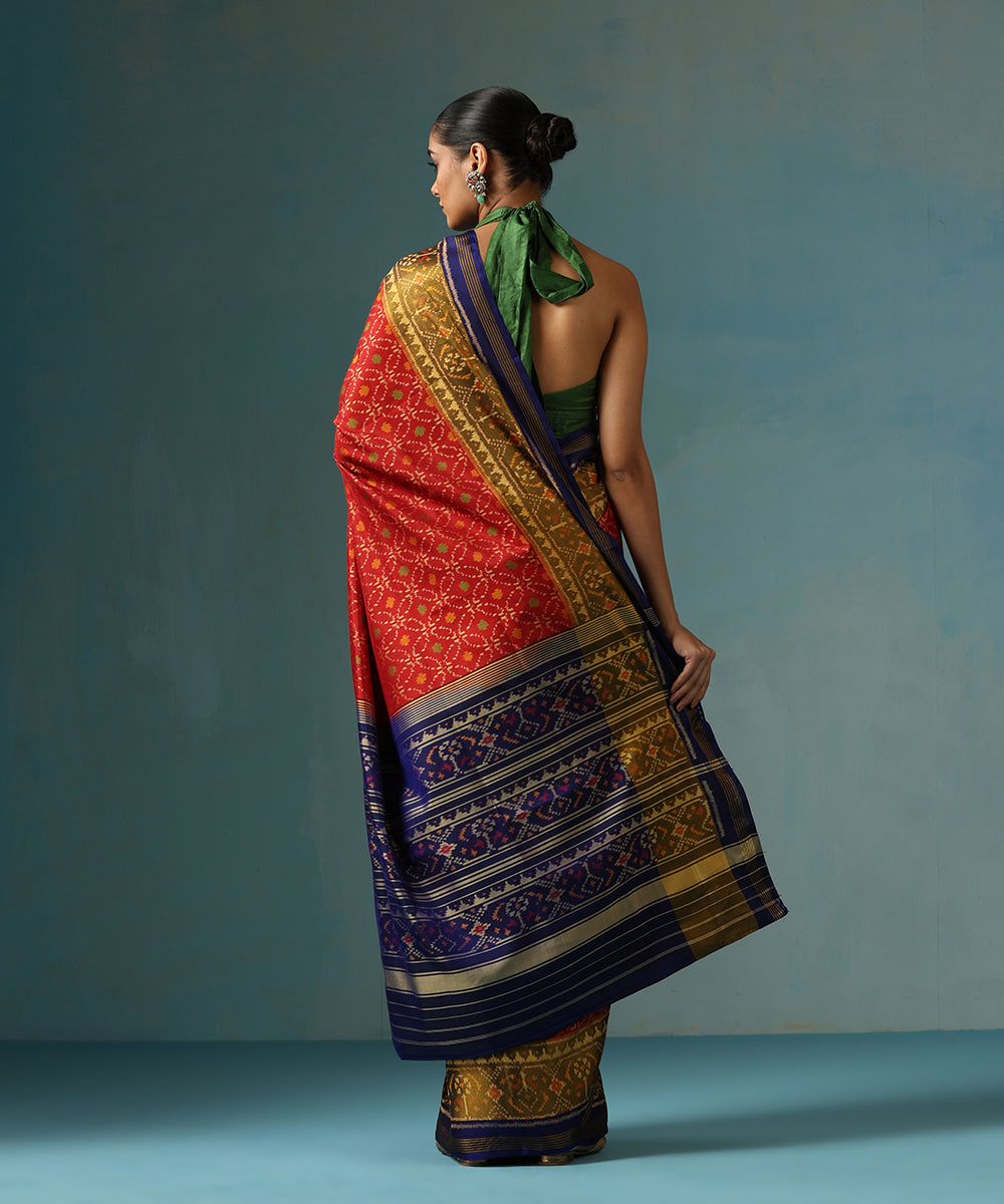 Handloom_Maroon_Pure_Mulberry_Silk_Ikat_Patola_Saree_With_Blue_Border_WeaverStory_03