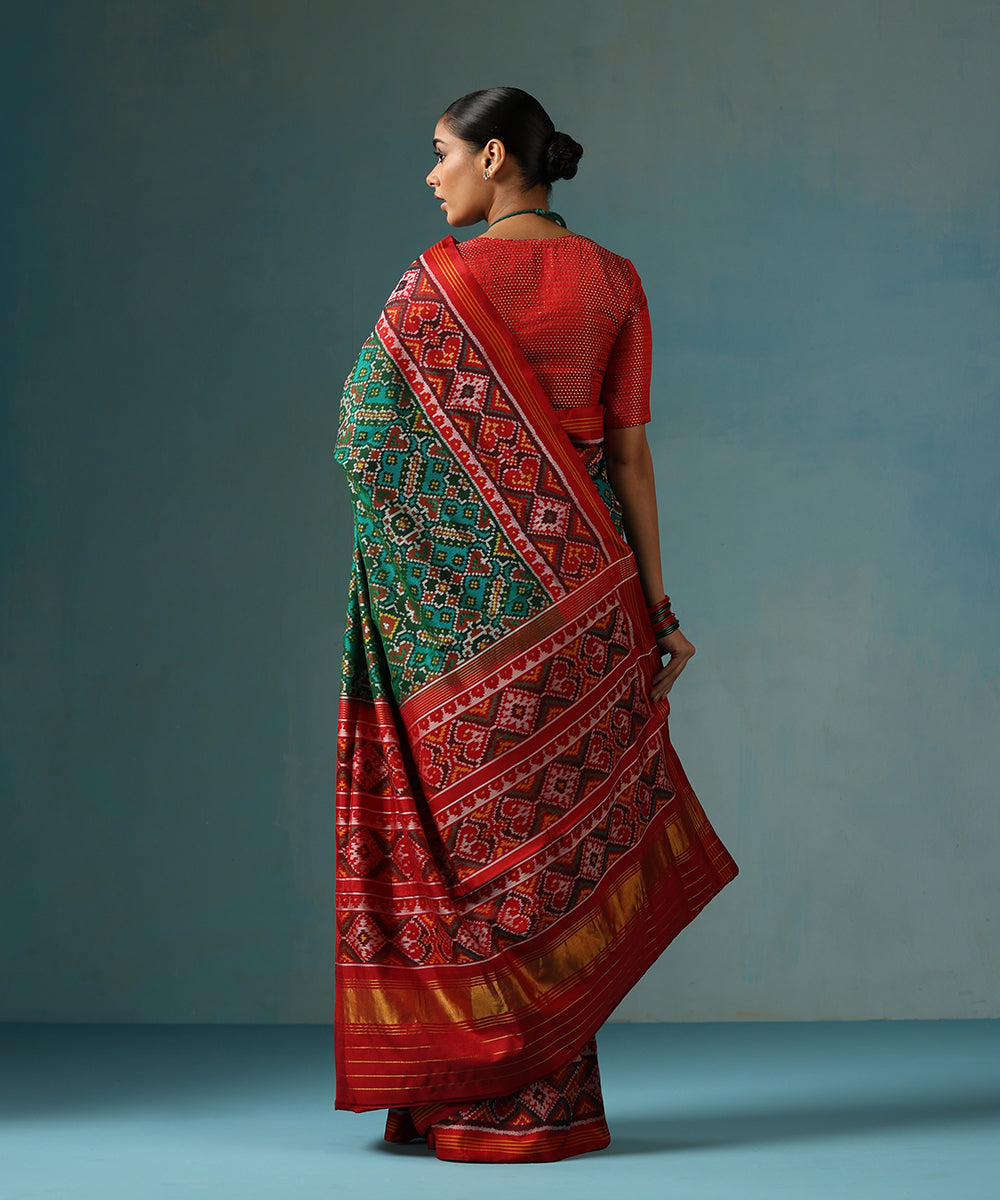 Handloom_Green_And_Red_Pure_Mulberry_Silk_Ikat_Patola_Saree_With_Geometric_Motif_WeaverStory_03