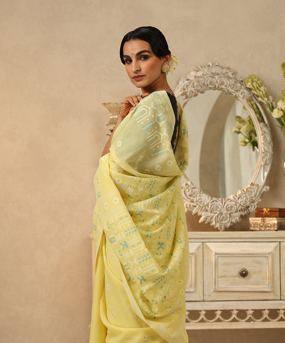 Handloom_Lime_Yellow_Mulmul_Dhakai_Jamdani_Saree_With_White_Flower_Motif_WeaverStory_01