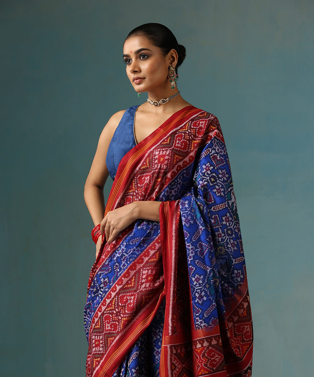 Handloom_Blue_Pure_Mulberry_Silk_Ikat_Patola_Saree_With_Red_Border_And_Palla_WeaverStory_01