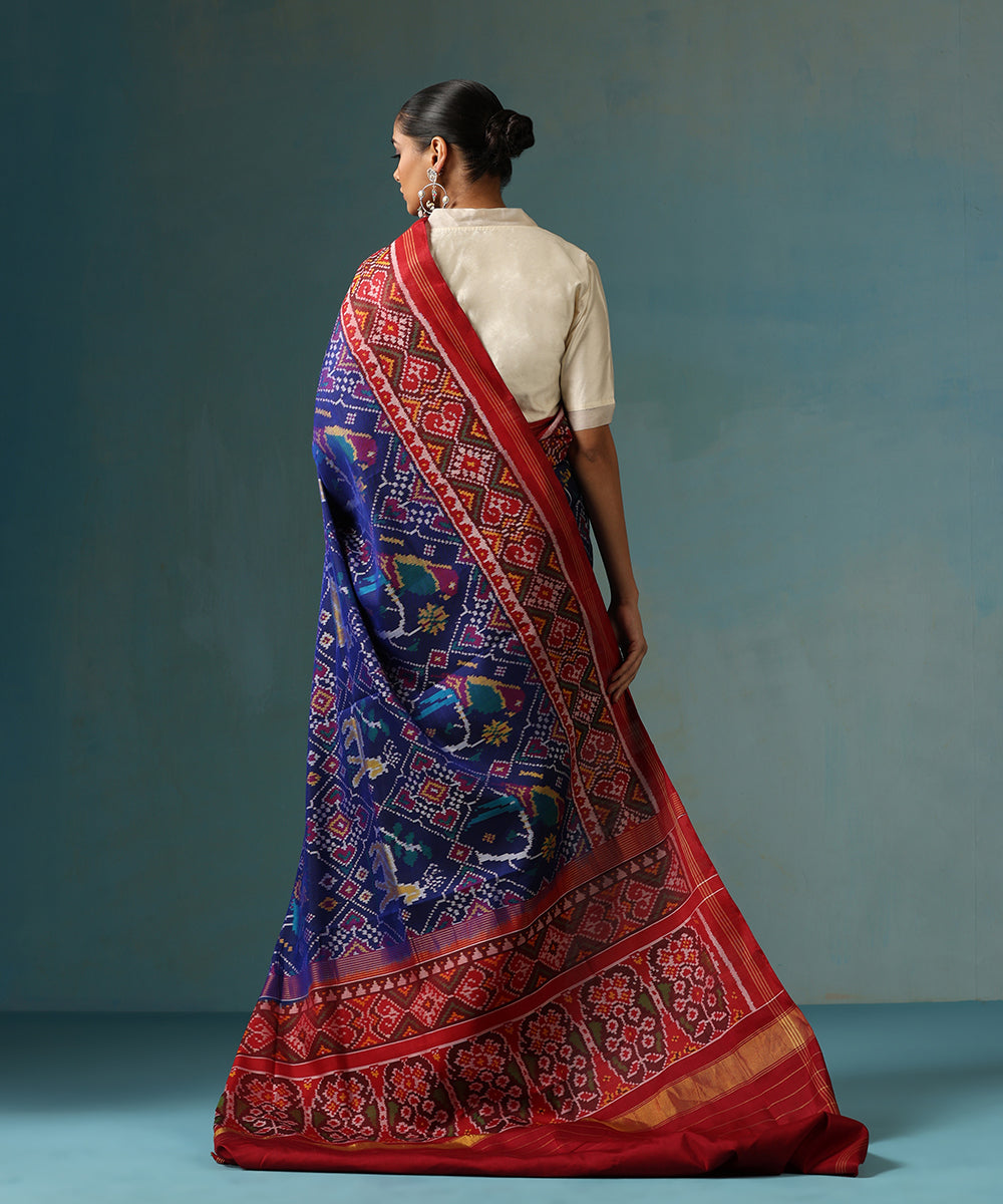 Handloom_Blue_And_Red_Pure_Mulberry_Silk_Ikat_Patola_Saree_With_Peacock_And_Deer_Motif_WeaverStory_03