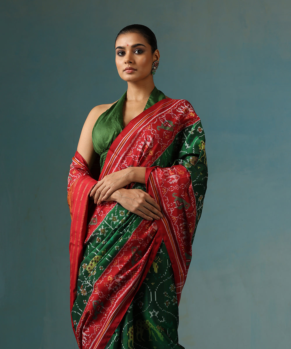 Green_Handloom_Pure_Mulberry_Silk_Ikat_Patola_Saree_With_Red_Border_And_Palla_WeaverStory_01