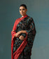 Handloom_Black_And_Red_Pure_Mulberry_Silk_Ikat_Patola_Saree_With_Peacock_Motif_WeaverStory_01