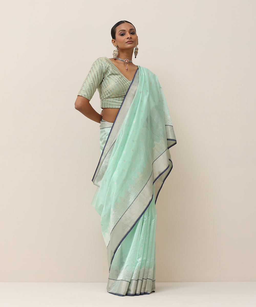 Aqua_Green_Handloom_Pure_Silk_Chanderi_Saree_With_Silver_Zari_Bootas_And_Blue_Selvedge_WeaverStory_01