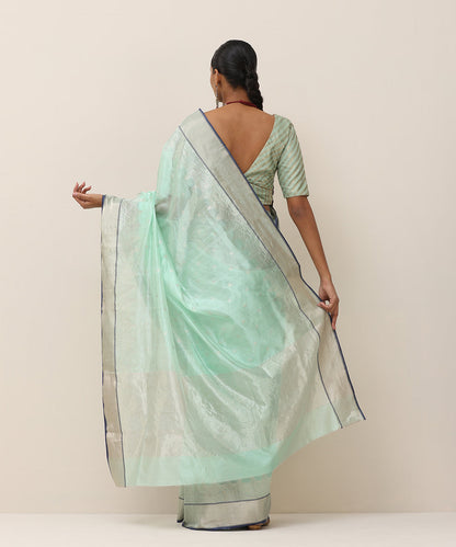 Aqua_Green_Handloom_Pure_Silk_Chanderi_Saree_With_Silver_Zari_Bootas_And_Blue_Selvedge_WeaverStory_03