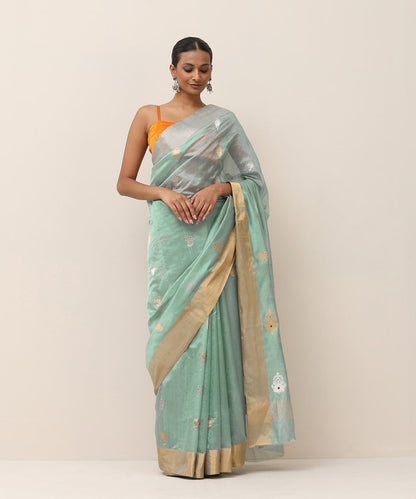 Light_Blue_Handloom_Pure_Silk_Chanderi_Saree_With_Flower_Boota_And_Orange_Selvedge_WeaverStory_01