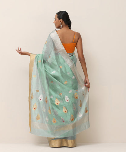 Light_Blue_Handloom_Pure_Silk_Chanderi_Saree_With_Flower_Boota_And_Orange_Selvedge_WeaverStory_03