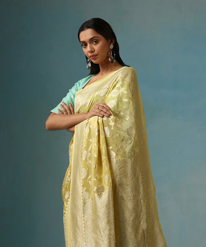 Handloom_Powder_Yellow_Pure_Georgette_Banarasi_Saree_With_Allover_Cutwork_Floral_Jaal_WeaverStory_02