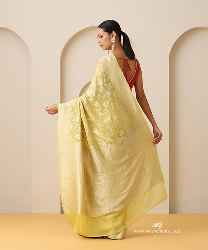 Yellow_Handloom_Georgette_Cutwork_Saree_With_Floral_Jaal_And_Gold_Zari_Border_WeaverStory_03