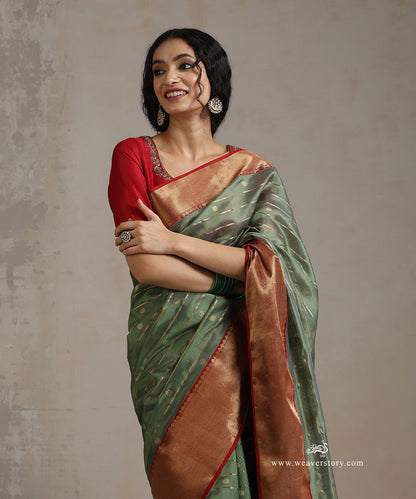 Handloom_Heena_Green_Pure_Silk_Chanderi_Saree_With_Zari_Line_And_Heavy_Red_Border_WeaverStory_01