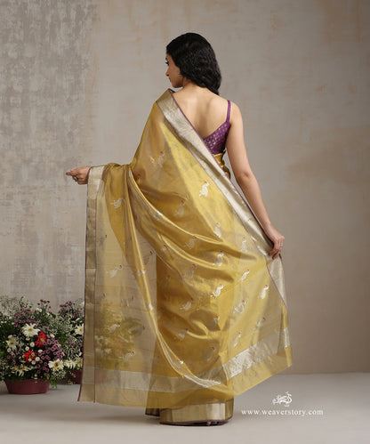 Lemon_Green_Handloom_Pure_Silk_Chanderi_Saree_With_Silver_Swan_Motifs_With_Purple_Selvedge_WeaverStory_03