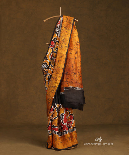 Handloom_Black_And_Mustard_Pure_Mulbery_Silk_Hand_Batik_Saree_WeaverStory_01