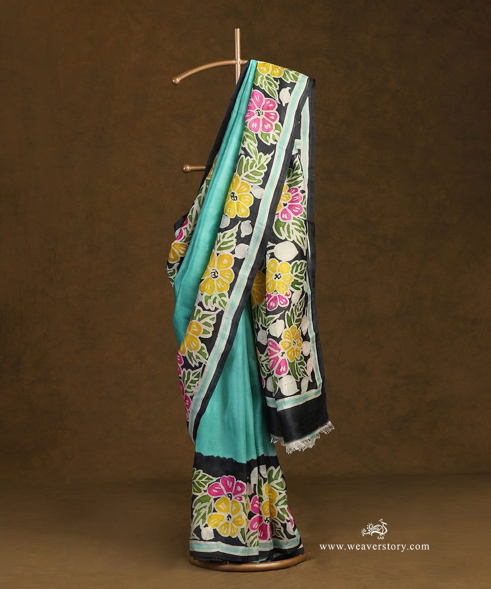 Handloom_Black_And_Ice_Blue_Pure_Mulbery_Silk_Hand_Batik_Saree_With_Flower_Motifs_On_Border_And_Pallu_WeaverStory_01