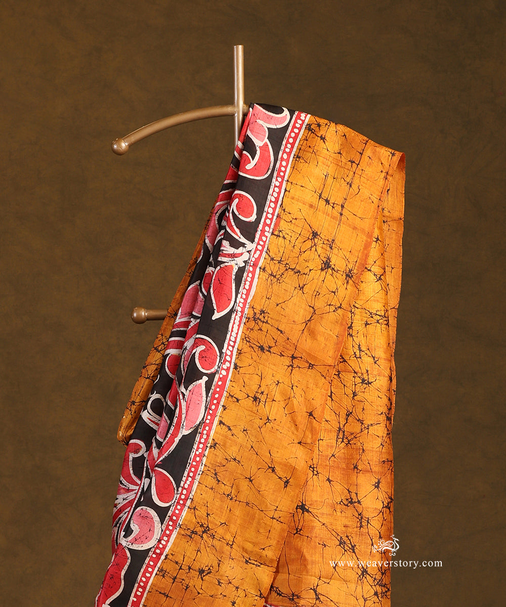 Handloom_Mustard_And_Black_Hand_Batik_Pure_Mulbery_Silk_Saree_WeaverStory_02