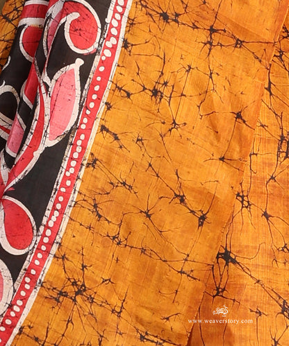 Handloom_Mustard_And_Black_Hand_Batik_Pure_Mulbery_Silk_Saree_WeaverStory_04