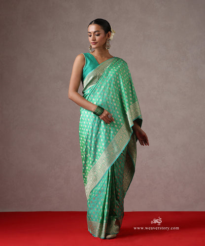 Light_Green_Handloom_Pure_Katan_Silk_Banarasi_Saree_With_Cutwork_Lotus_Jaal_WeaverStory_02