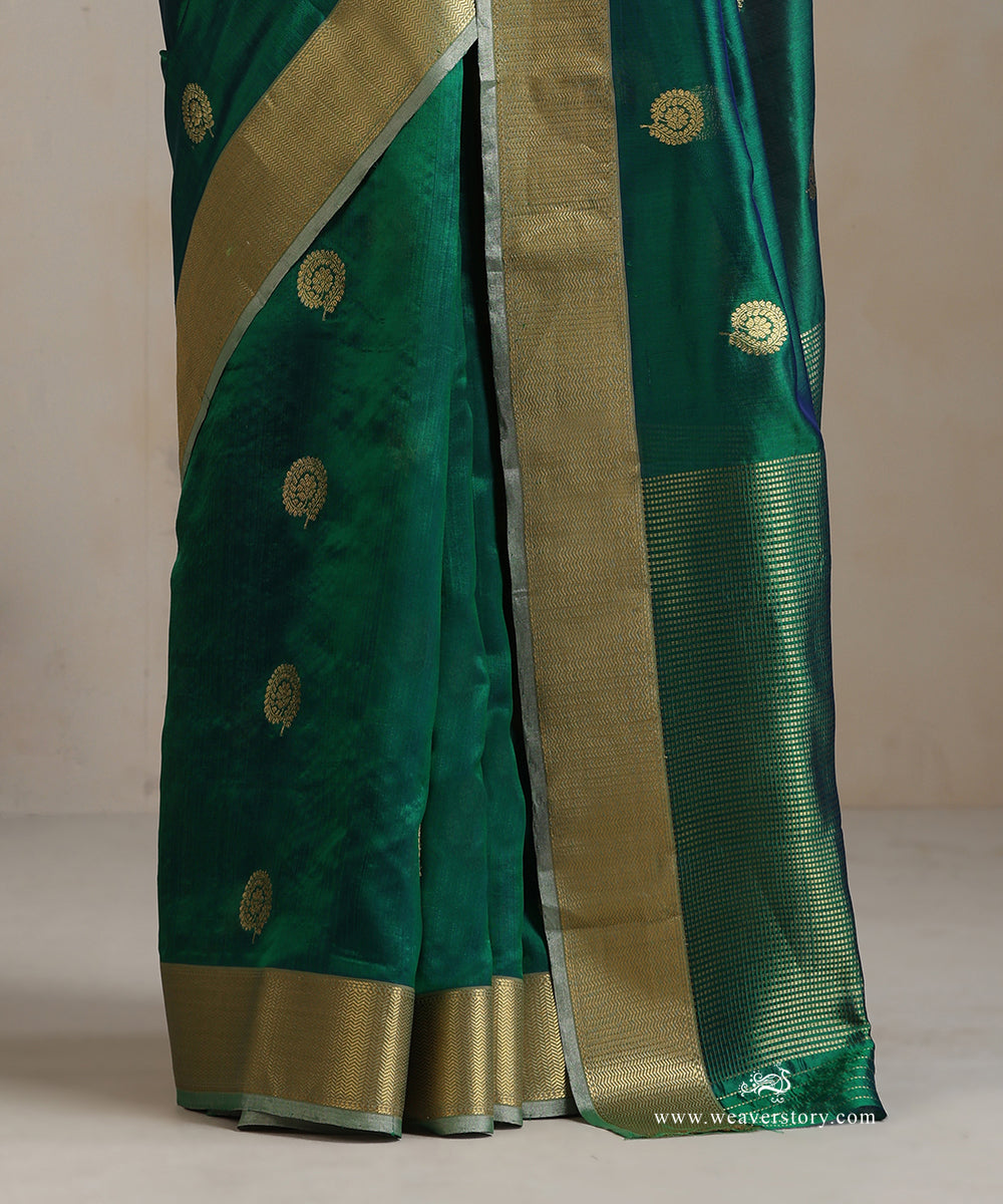 Handloom_Peacock_Green_Silk_Chanderi_Saree_With_Rangoli_Boota_And_Gold_Saffron_Border_WeaverStory_04