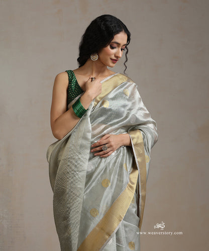 Gray_Handloom_Pure_Silk_Chanderi_Saree_With_Rangoli_Boota_And_Gold_Saffron_Border_WeaverStory_01