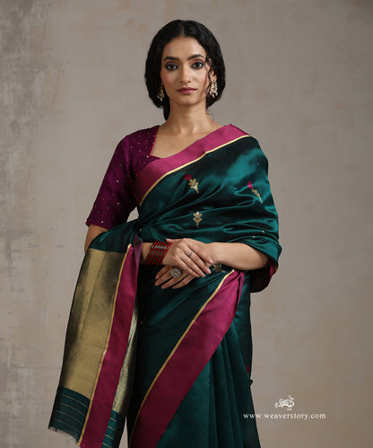 Dark_Green_Handloom_Pure_Silk_Chanderi_Saree_With_Genda_Boota_And_Purple_Border_WeaverStory_01