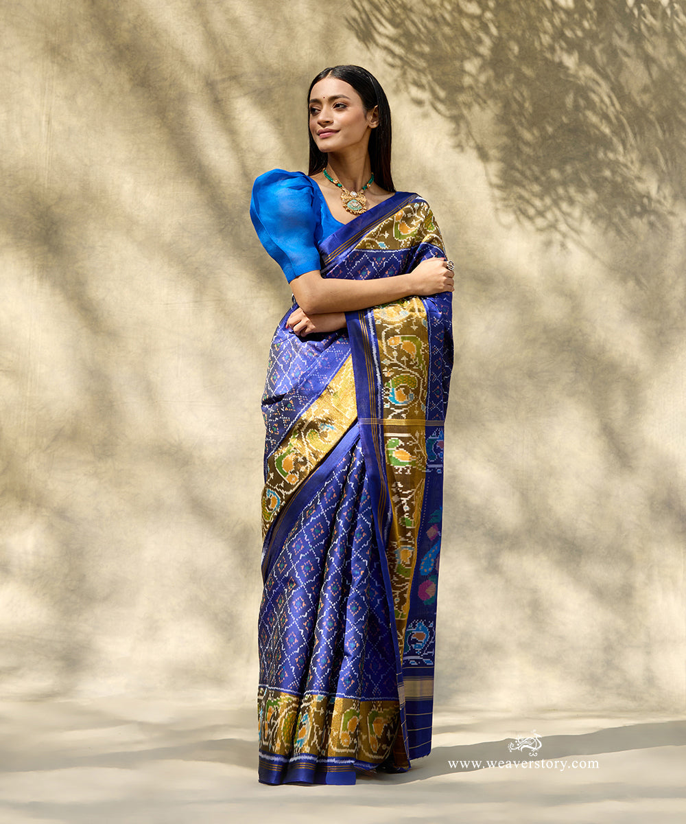 Handloom_Blue_Pure_Mulberry_Silk_Ikat_Patola_Saree_With_Peacock_Motif_And_Tissue_Pallu_WeaverStory_01