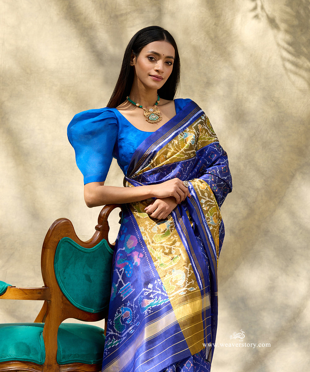 Handloom_Blue_Pure_Mulberry_Silk_Ikat_Patola_Saree_With_Peacock_Motif_And_Tissue_Pallu_WeaverStory_02