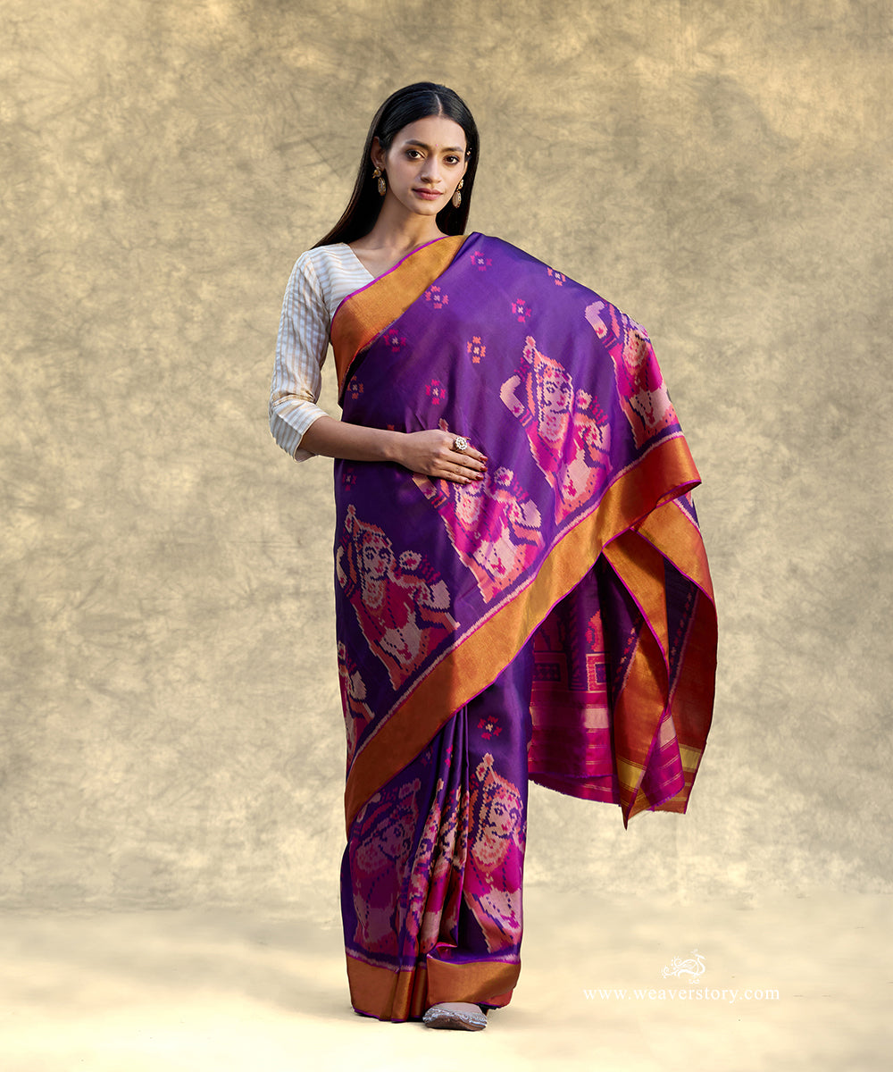 Purple_Handloom_Pure_Mulberry_Silk_Ikat_Patola_Saree_With_Nartaki_Motif_On_Pallu_WeaverStory_01