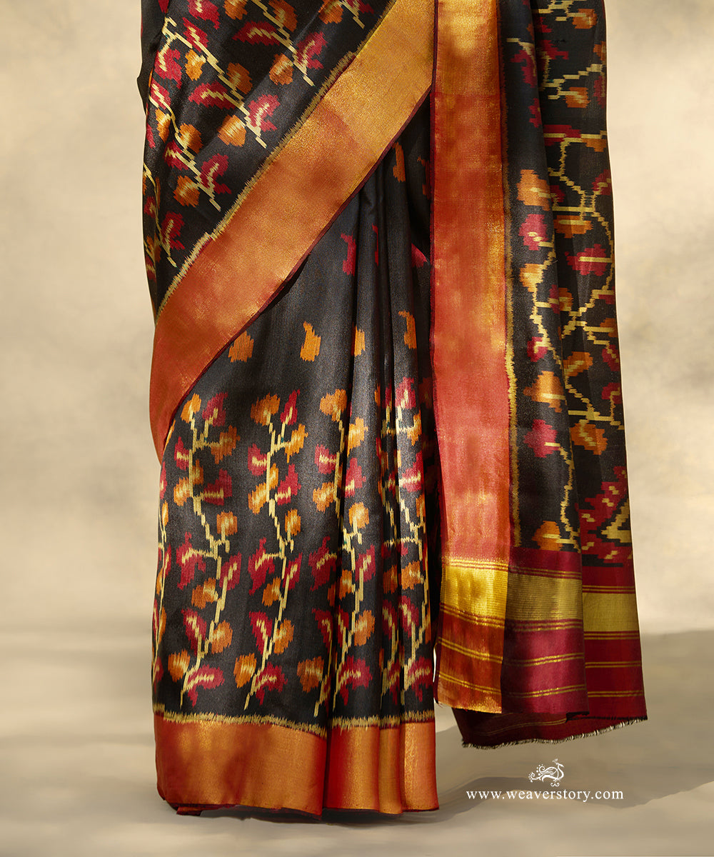 Black_Handloom_Pure_Mulberry_Silk_Ikat_Patola_Saree_With_Big_Peacock_Motif_On_Pallu_And_Gold_Zari_Border_WeaverStory_04