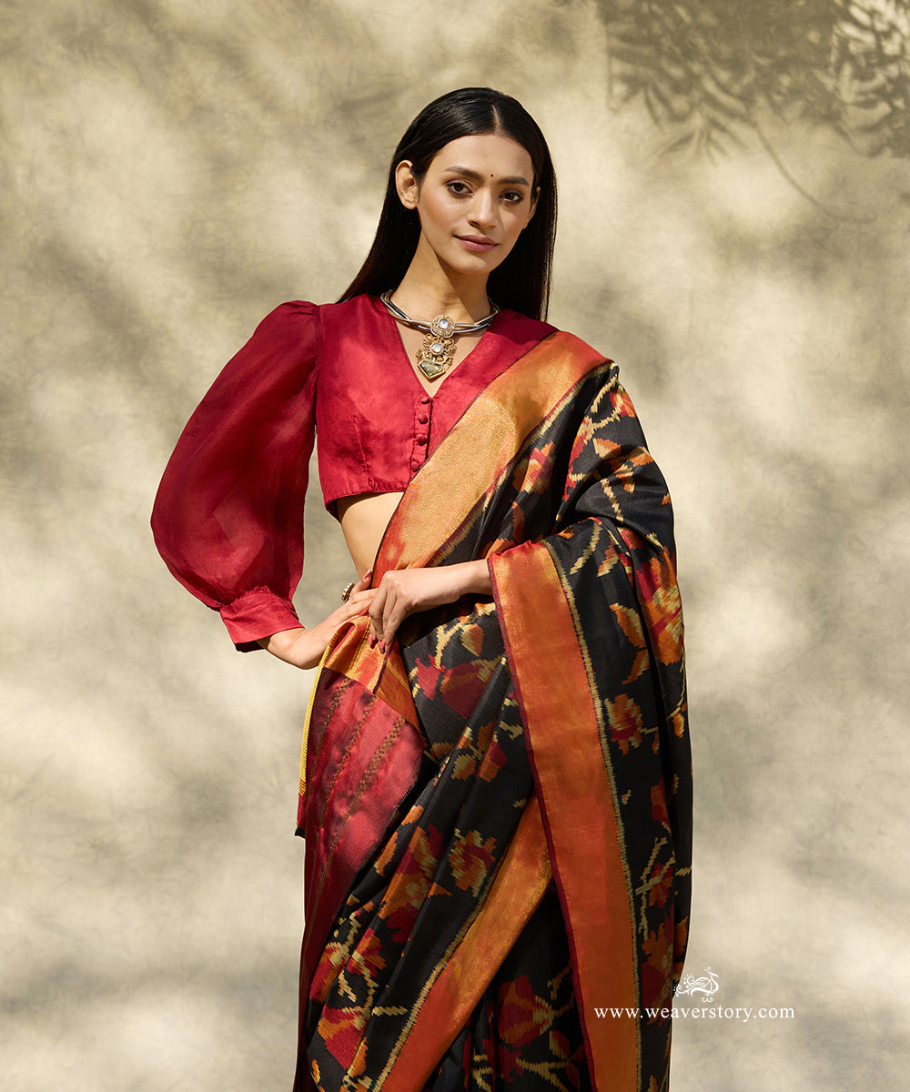 Black_Handloom_Pure_Mulberry_Silk_Ikat_Patola_Saree_With_Allover_Flower_Motif_And_Maroon_Border_And_Pallu_WeaverStory_02