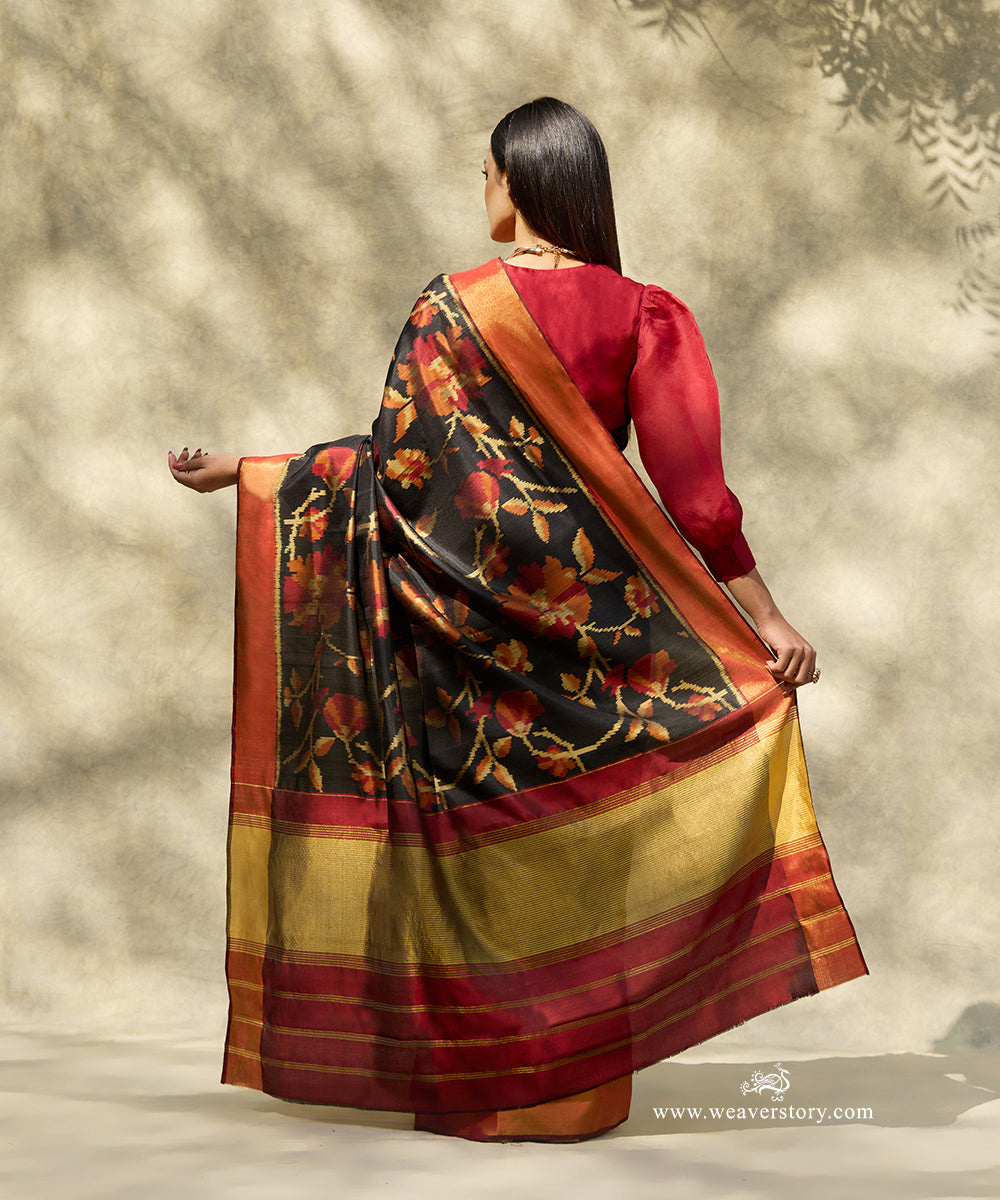 Black_Handloom_Pure_Mulberry_Silk_Ikat_Patola_Saree_With_Allover_Flower_Motif_And_Maroon_Border_And_Pallu_WeaverStory_03