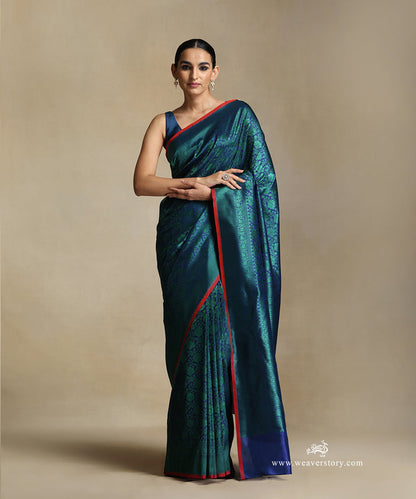 Handloom_Blue_Pure_Katan_Silk_Tanchoi_Banarasi_Saree_With_Green_Flower_Jaal_And_Zigzag_Border_WeaverStory_02