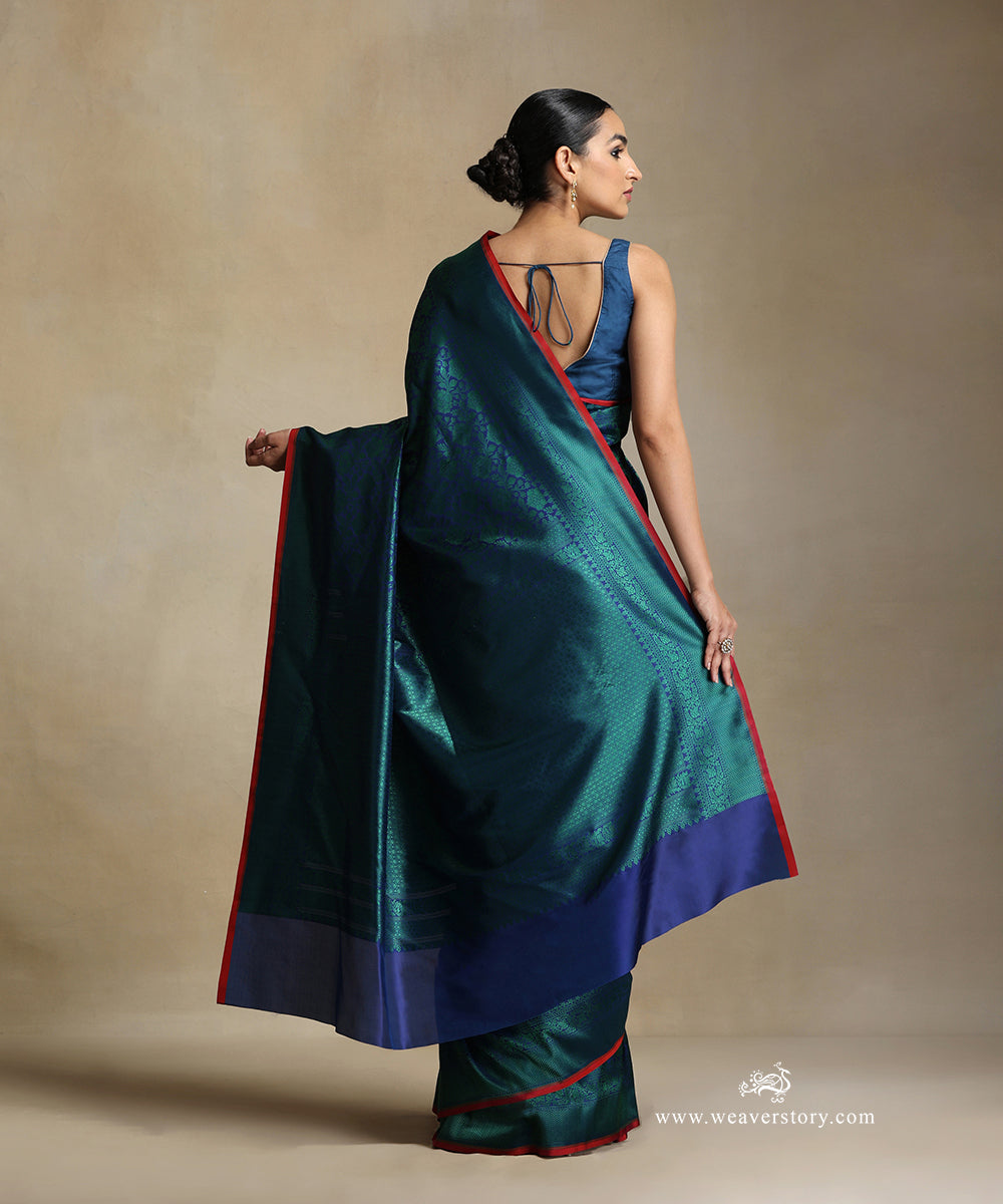 Handloom_Blue_Pure_Katan_Silk_Tanchoi_Banarasi_Saree_With_Green_Flower_Jaal_And_Zigzag_Border_WeaverStory_03