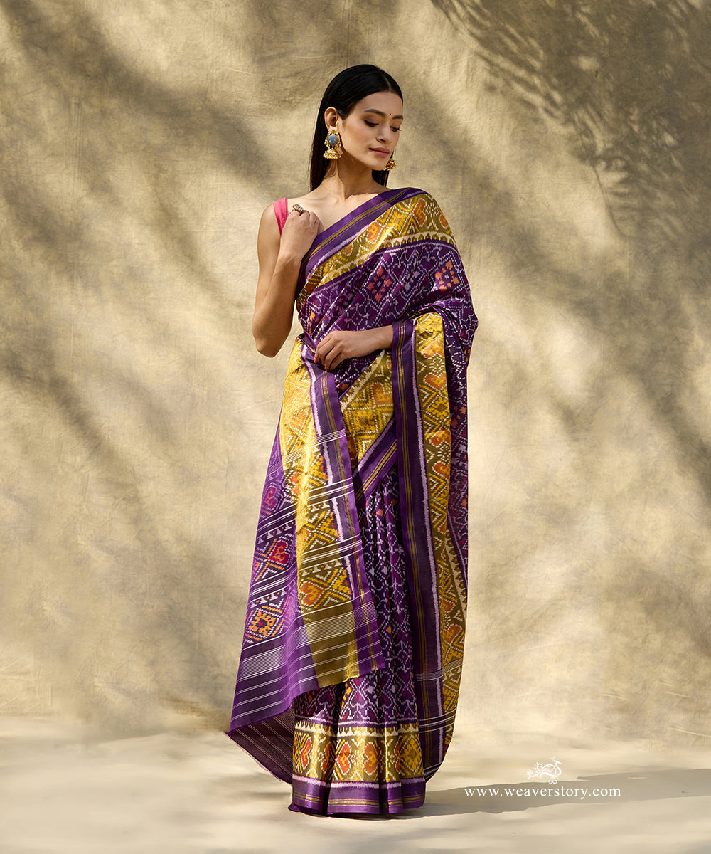 Purple_Handloom_Pure_Mulberry_Silk_Traditional_Ikat_Patola_Saree_With_Tissue_Border_WeaverStory_01