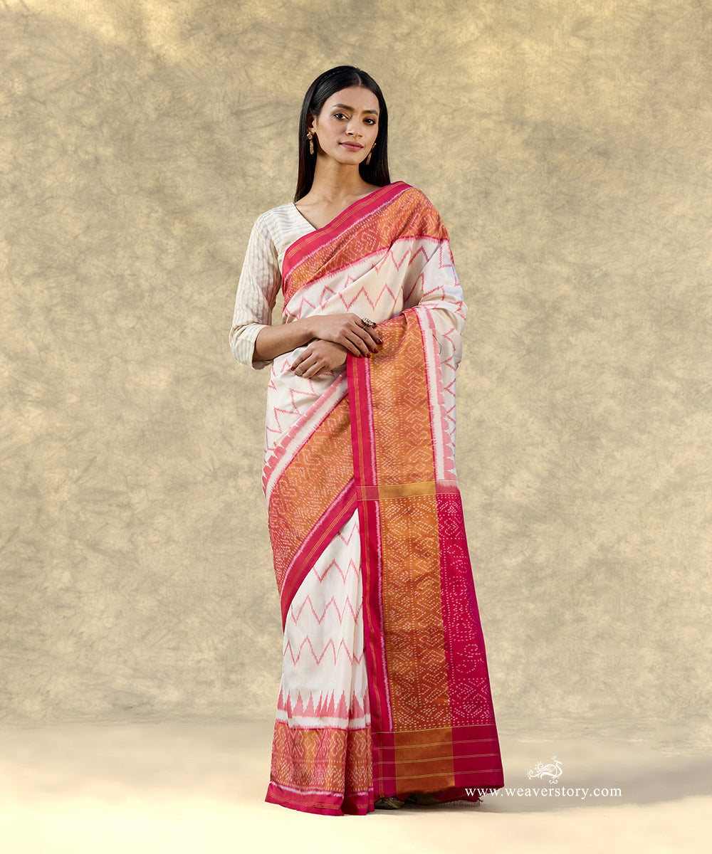 White_Handloom_Pure_Mulberry_Silk_Ikat_Patola_Saree_With_Pink_Border_And_Pallu_WeaverStory_01