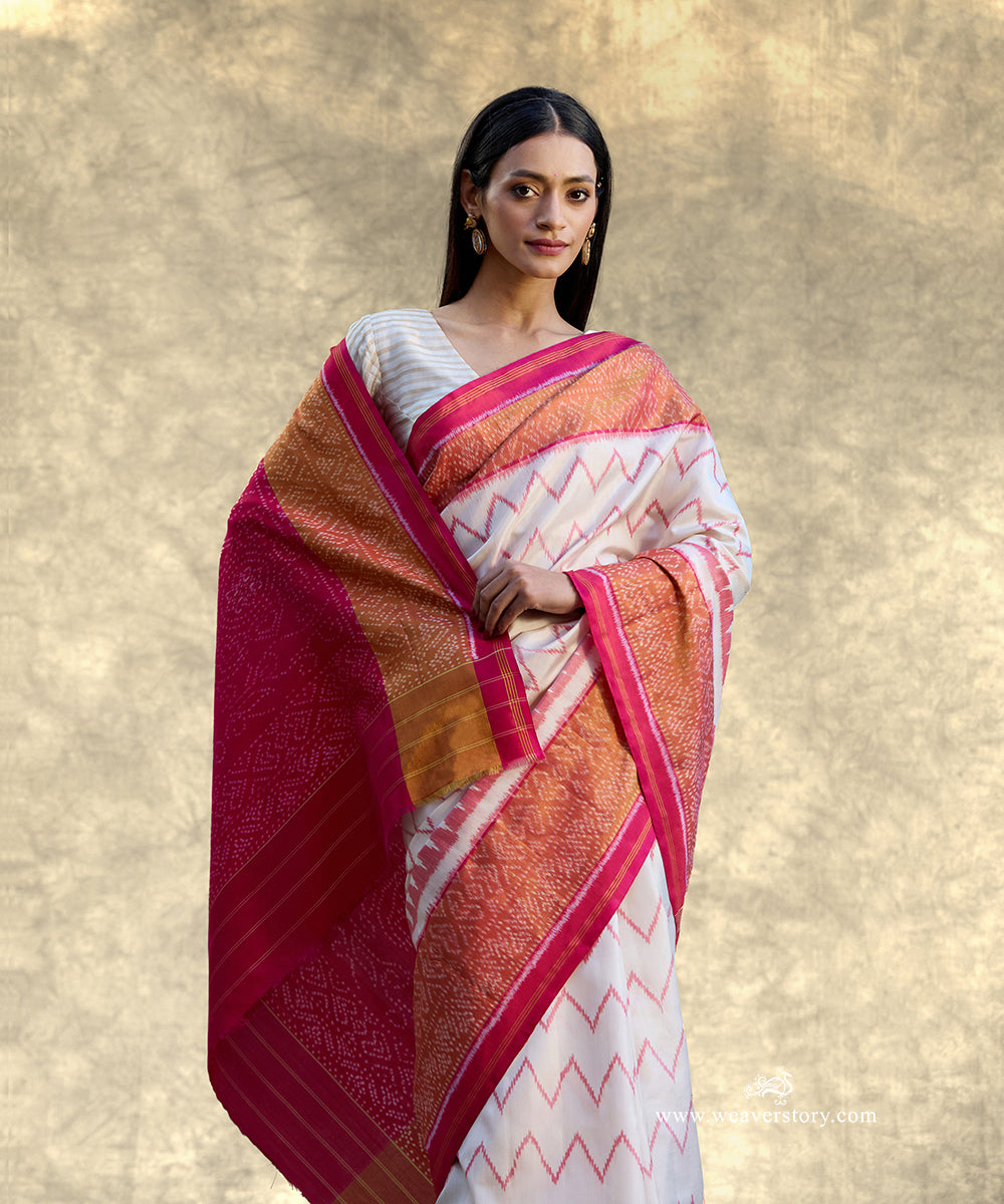 White_Handloom_Pure_Mulberry_Silk_Ikat_Patola_Saree_With_Pink_Border_And_Pallu_WeaverStory_02