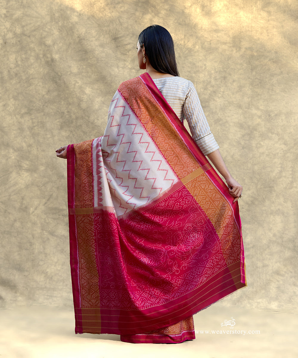 White_Handloom_Pure_Mulberry_Silk_Ikat_Patola_Saree_With_Pink_Border_And_Pallu_WeaverStory_03