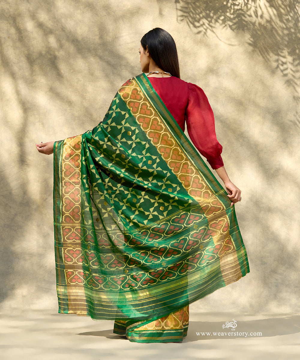 Bottle_Green_Handloom_Pure_Mulberry_Silk_Ikat_Patola_Saree_With_Gold_Zari_Booti_And_Tissue_Border_WeaverStory_03