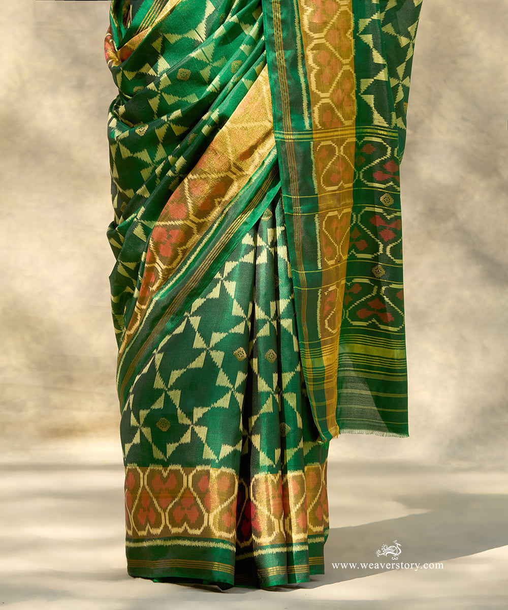 Bottle_Green_Handloom_Pure_Mulberry_Silk_Ikat_Patola_Saree_With_Gold_Zari_Booti_And_Tissue_Border_WeaverStory_04