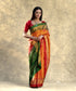 Red_And_Orange_Handloom_Pure_Mulberry_Silk_Ikat_Patola_Saree_With_Green_Pallu_WeaverStory_01