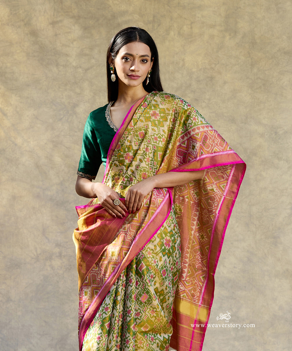 Pink_And_Green_Handloom_Pure_Mulberry_Tissue_Silk_Ikat_Patola_Saree_WeaverStory_02