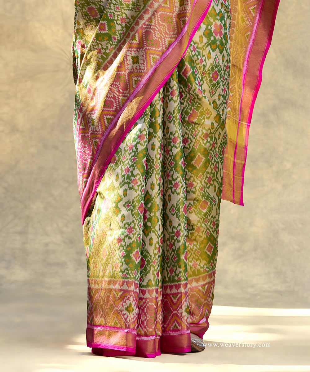 Pink_And_Green_Handloom_Pure_Mulberry_Tissue_Silk_Ikat_Patola_Saree_WeaverStory_04