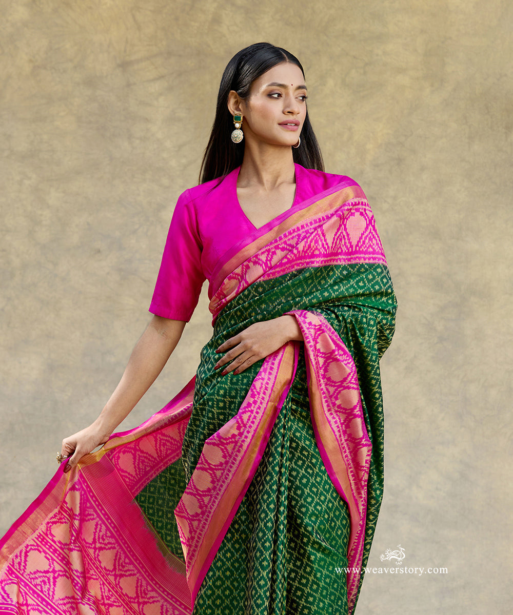 Dark_Green_Handloom_Pure_Pure_Mulberry_Silk_Ikat_Patola_Saree_With_Pink_Border_Pallu_WeaverStory_02