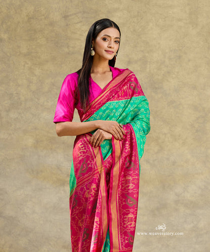 Aqua_Blue_And_Green_Handloom_Pure_Pure_Mulberry_Silk_Ikat_Patola_Saree_With_Pink_Border_Pallu_WeaverStory_02