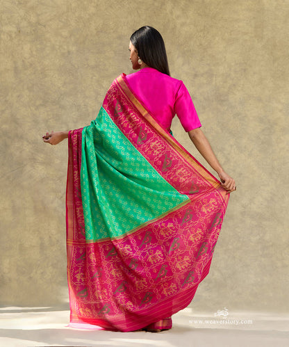 Aqua_Blue_And_Green_Handloom_Pure_Pure_Mulberry_Silk_Ikat_Patola_Saree_With_Pink_Border_Pallu_WeaverStory_03