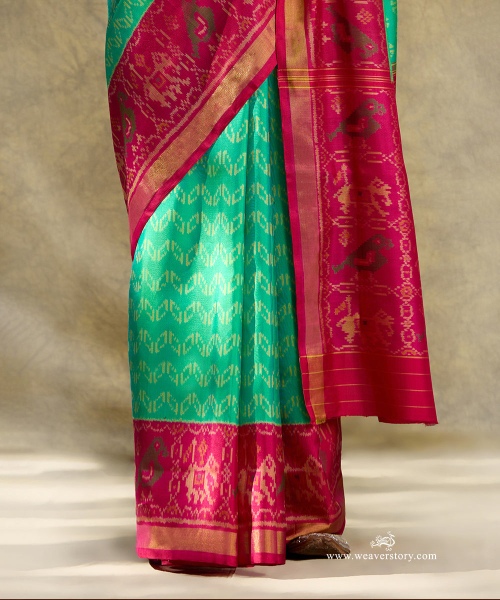 Aqua_Blue_And_Green_Handloom_Pure_Pure_Mulberry_Silk_Ikat_Patola_Saree_With_Pink_Border_Pallu_WeaverStory_04