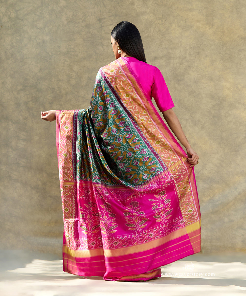 Green_Handloom_Pure_Mulberry_Silk_Ikat_Patola_Saree_With_Pink_Border_Pallu_WeaverStory_03