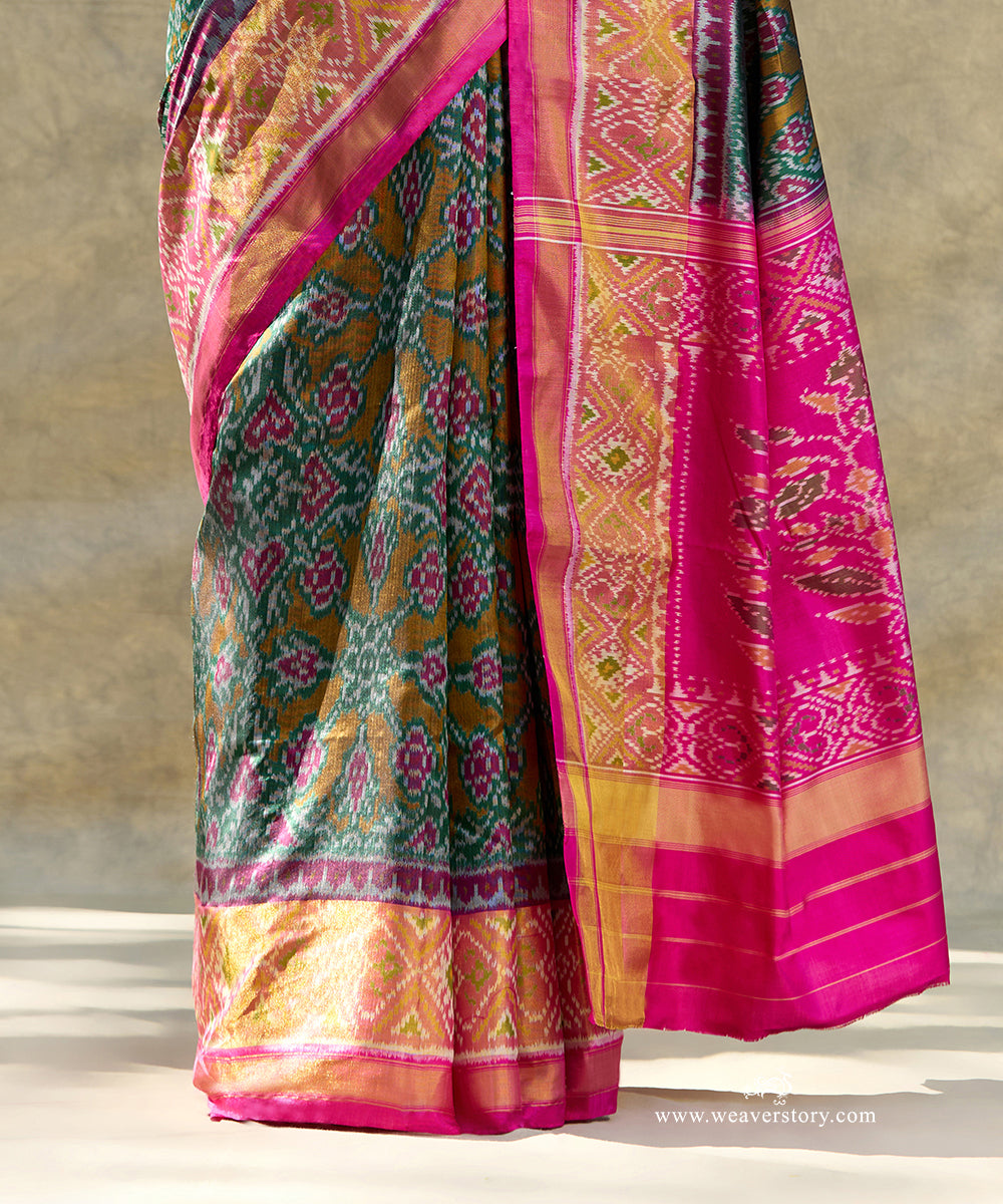 Green_Handloom_Pure_Mulberry_Silk_Ikat_Patola_Saree_With_Pink_Border_Pallu_WeaverStory_04