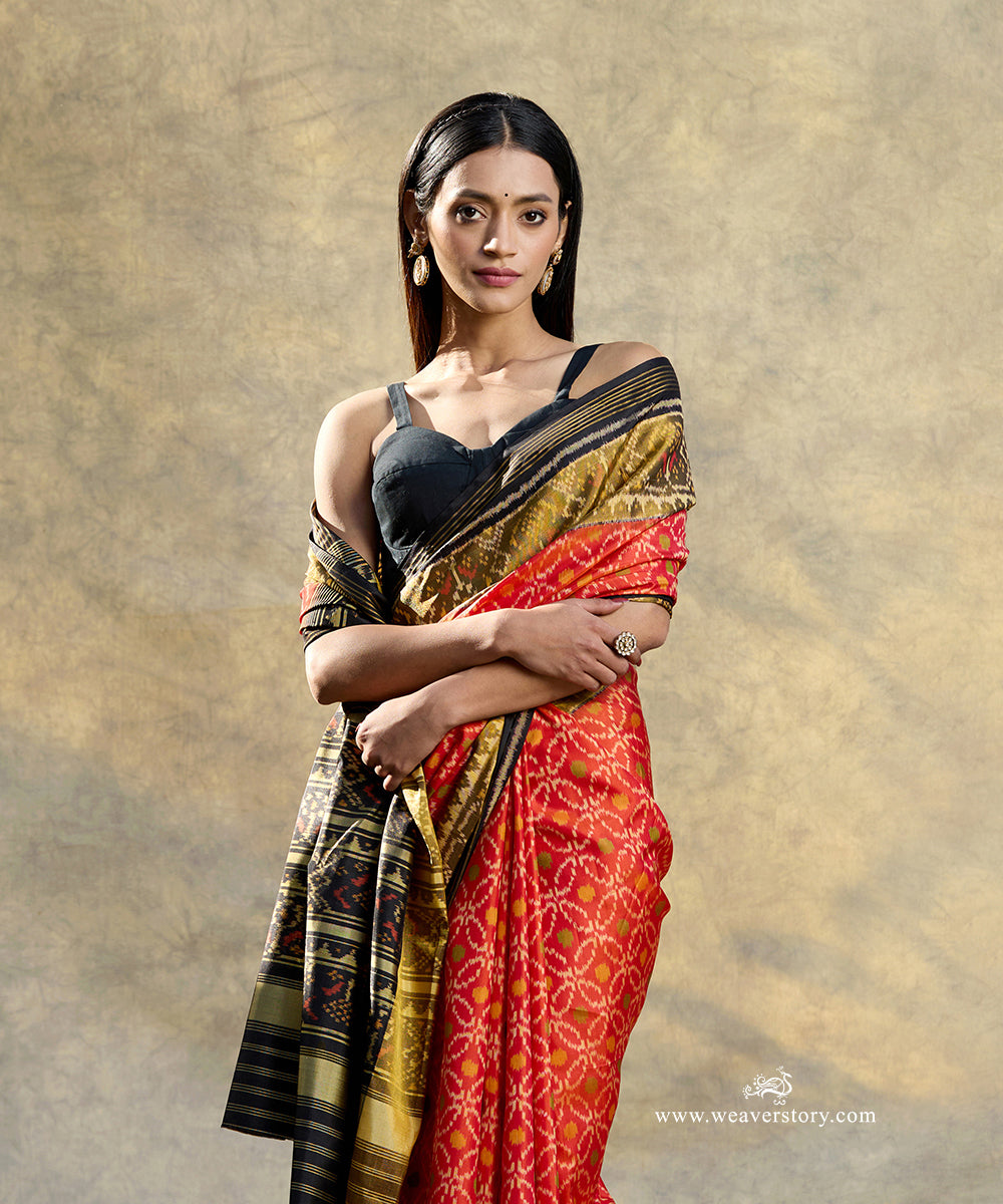 Rust_Orange_Handloom_Pure_Mulberry_Silk_Ikat_Patola_Saree_With_Black_Border_Pallu_WeaverStory_02