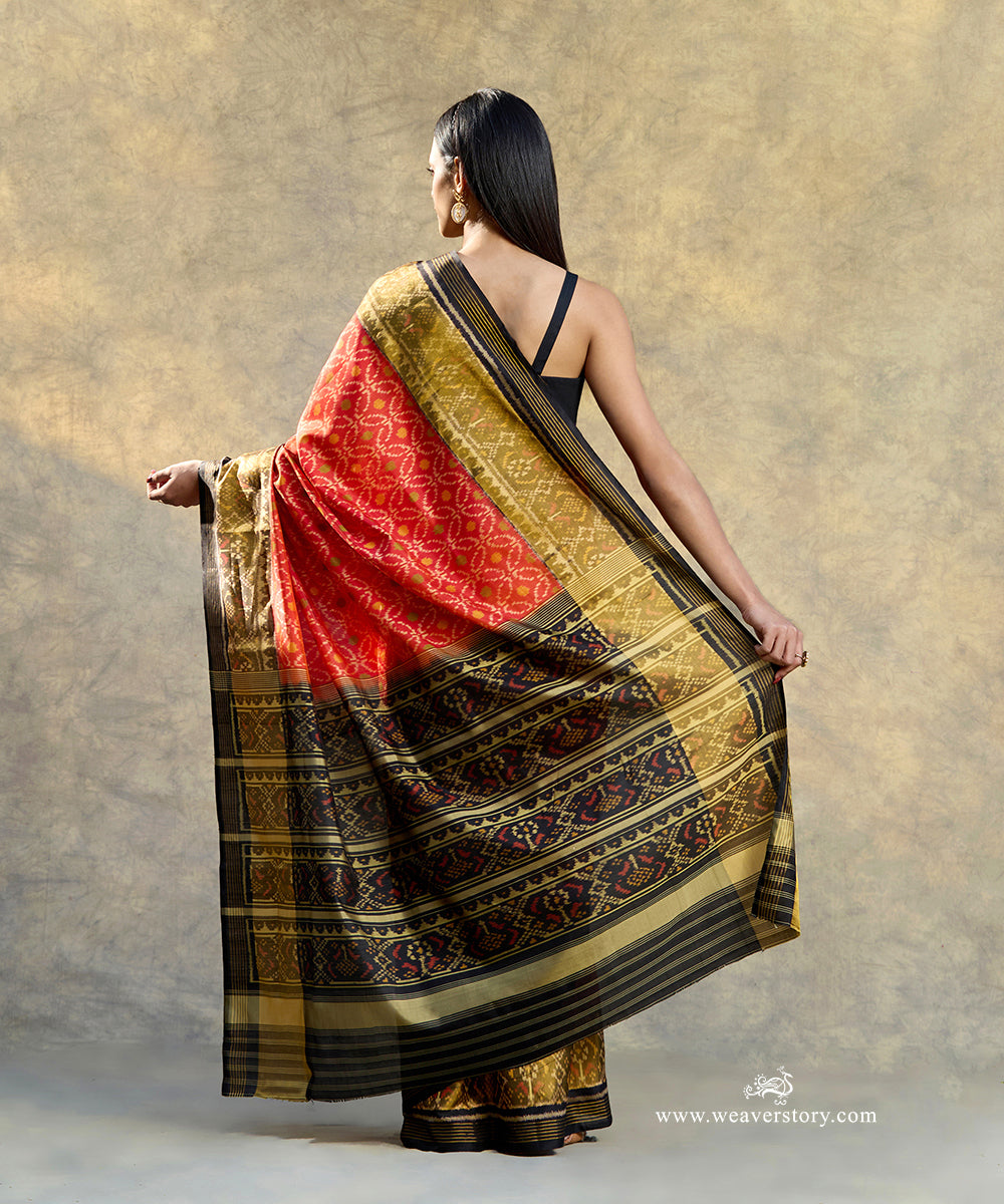 Rust_Orange_Handloom_Pure_Mulberry_Silk_Ikat_Patola_Saree_With_Black_Border_Pallu_WeaverStory_03