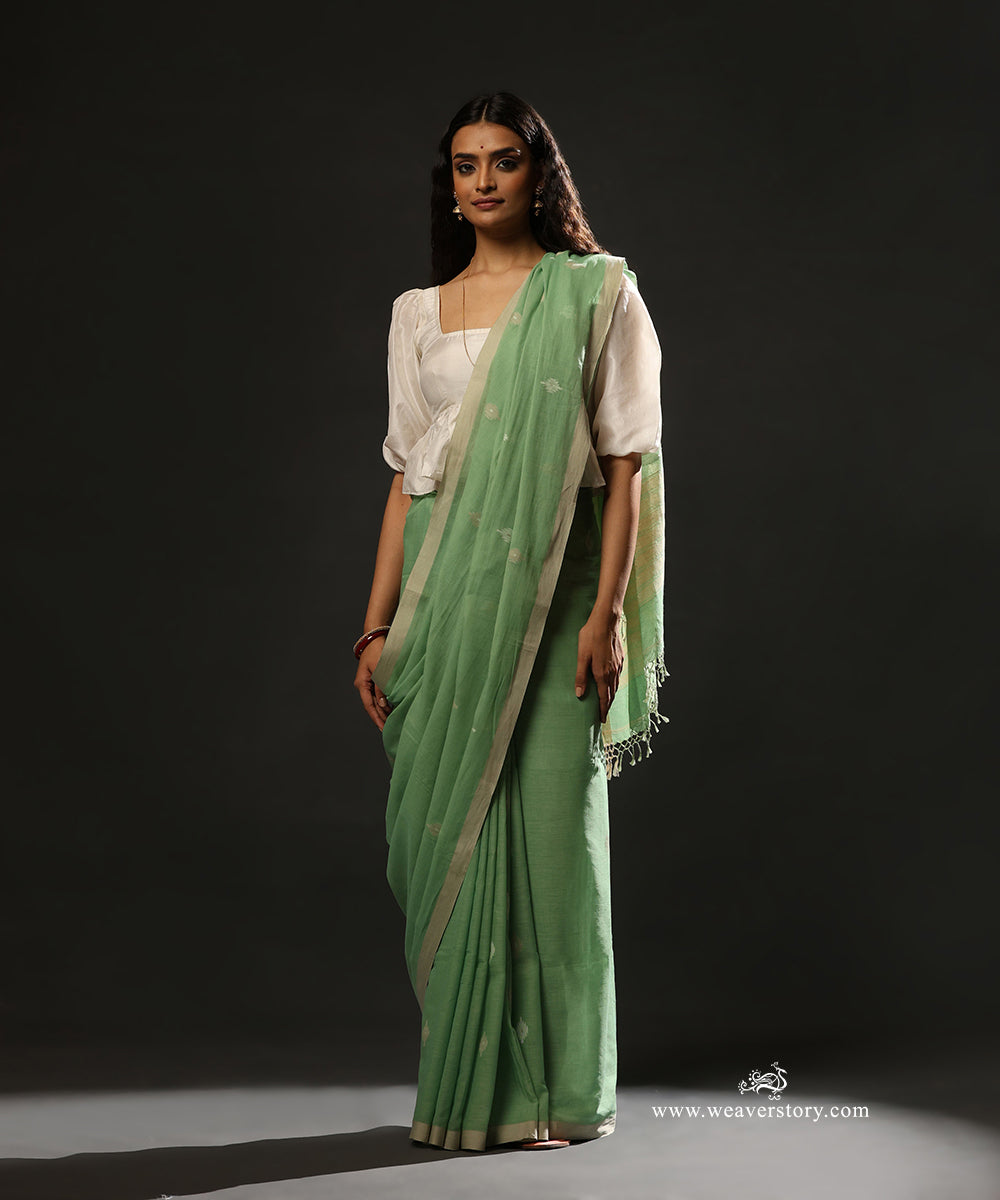 Mint_Green_Handloom_Pure_Mulmul_Dhakai_Jamdani_Saree_With_Peacock_Motifs_On_Palla_WeaverStory_01